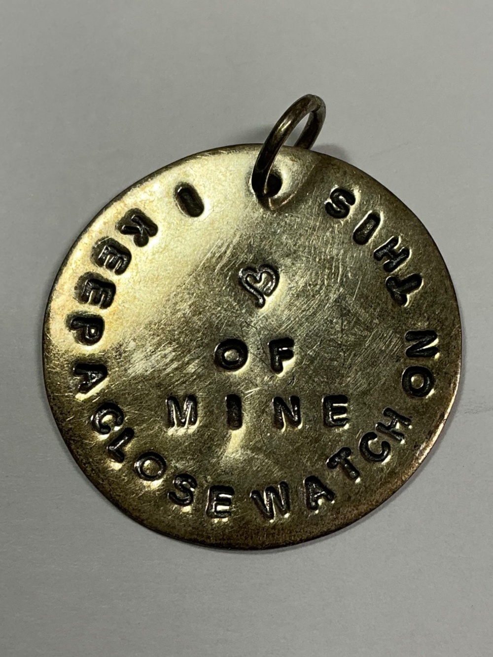 Sterling Silver Pendant with I keep a close watch on this heart of mine. 1 1/8”